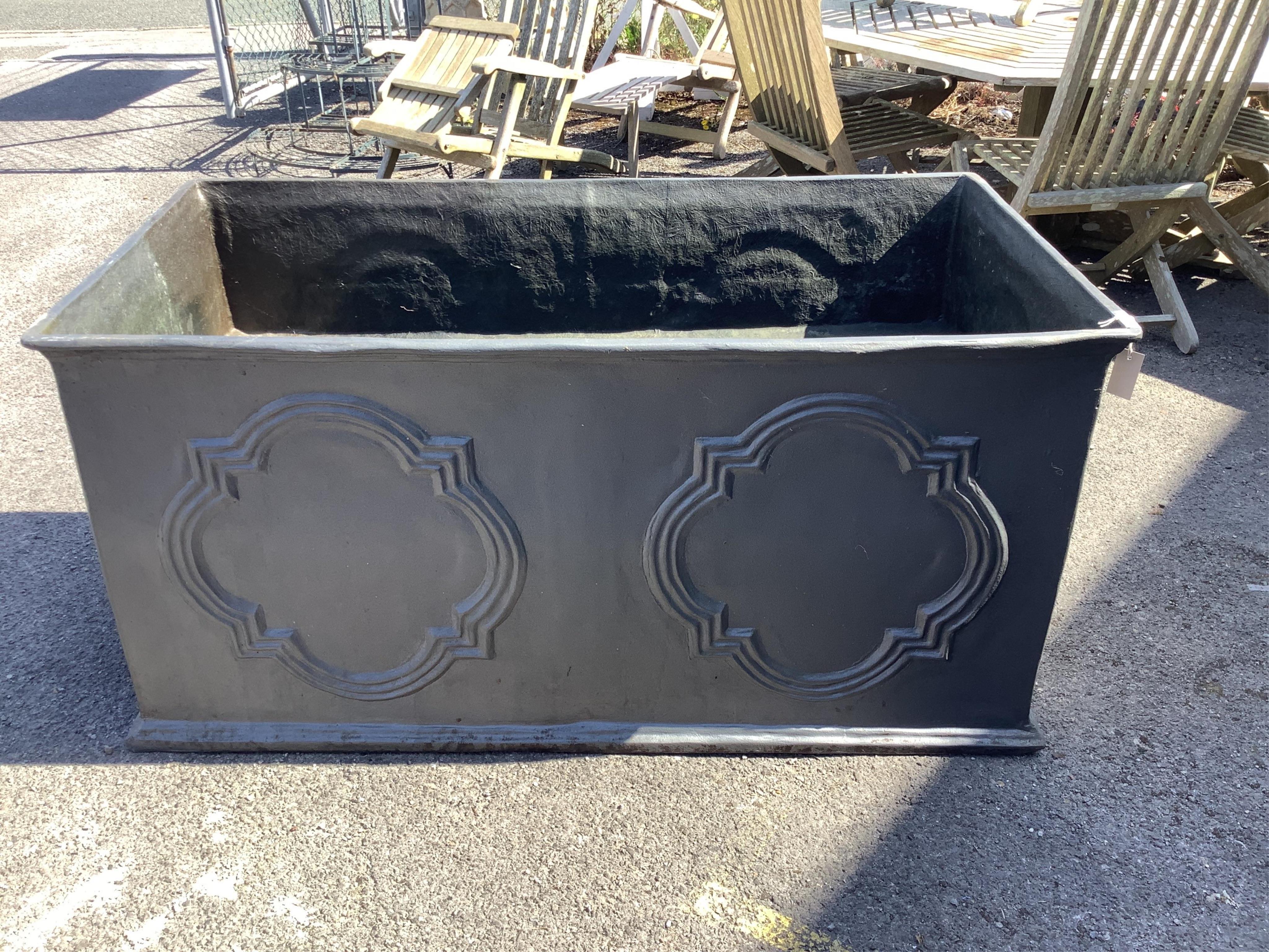A George II style rectangular faux lead water cistern, width 150cm, depth 77cm, height 75cm. Condition - good